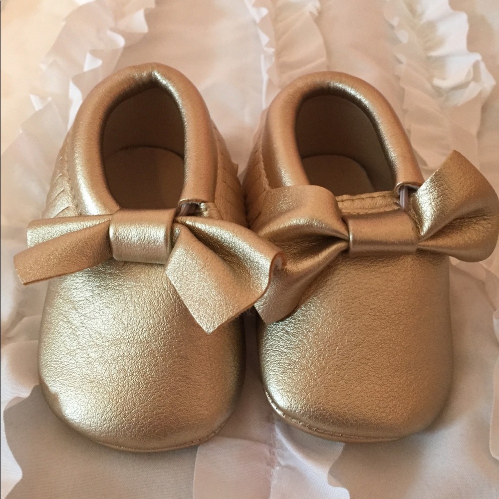 Gold moccasins